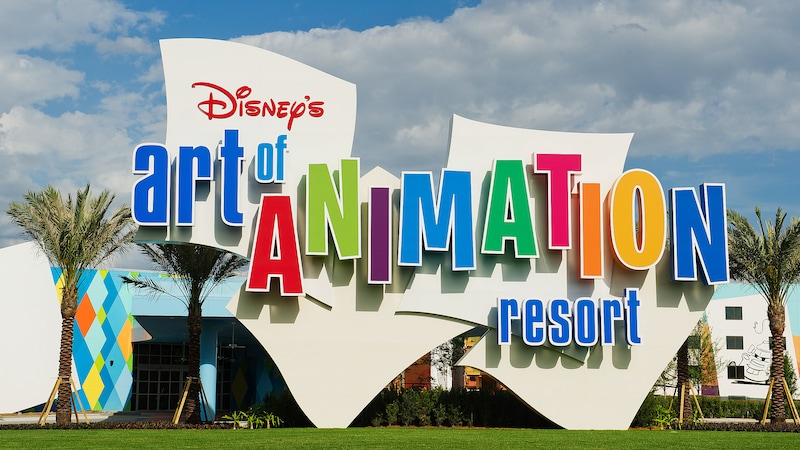 The colorful logo and building exterior of Disney's Art of Animation Resort