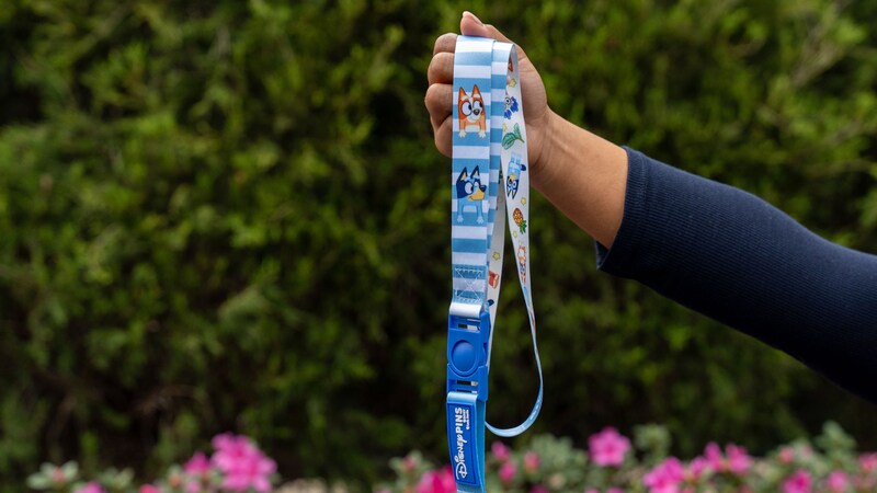 A Disney Pins lanyard featuring Bluey and Bingo
