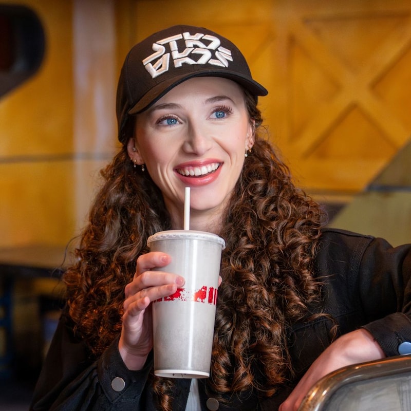 A Guest enjoying a drink at Docking Bay 7 Food and Cargo at Disney's Hollywood Studios theme park