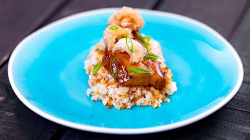 Braised Pork Belly Adobo and garlic fried rice on a plate