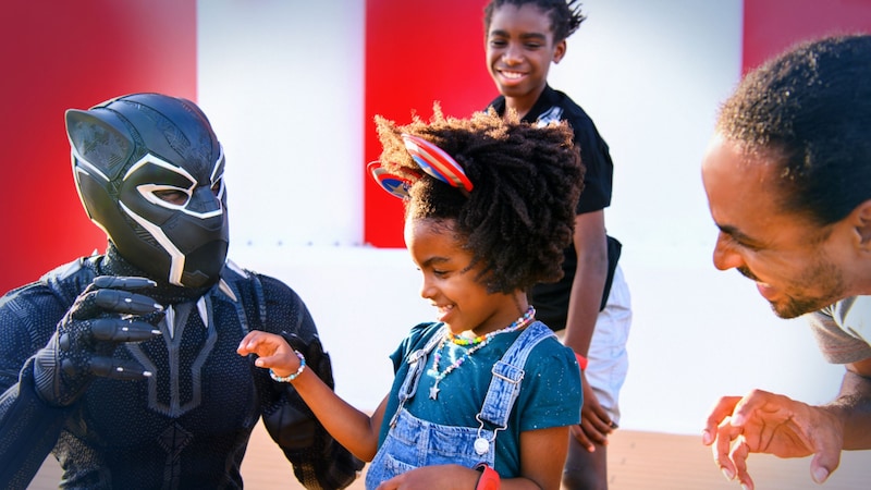 A small girl meeting the Black Panther