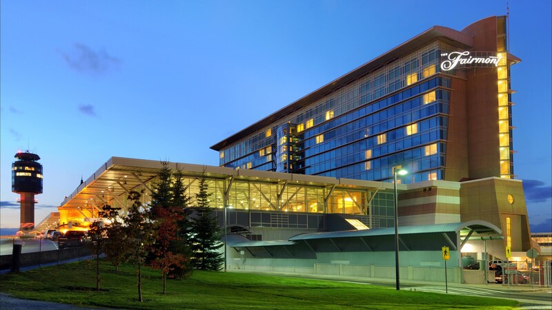 The multi story Fairmont Vancouver Airport Richmond at dusk