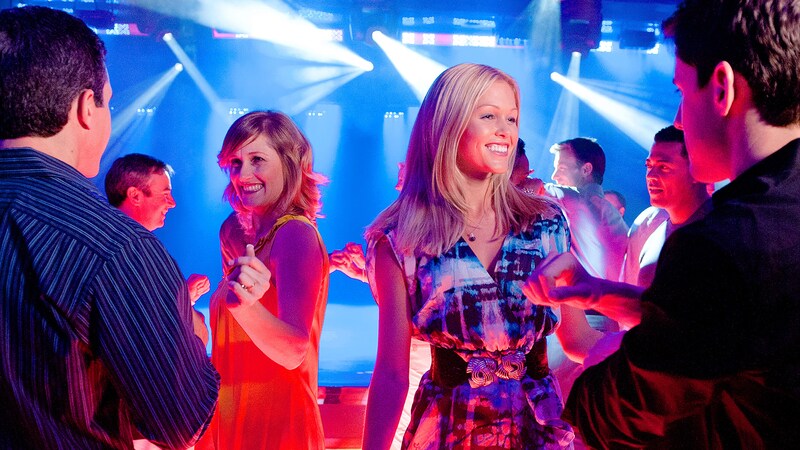 Couples dancing and having a good time on a nightclub dance floor