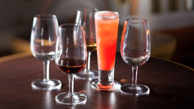 5 glasses containing various types of rum
