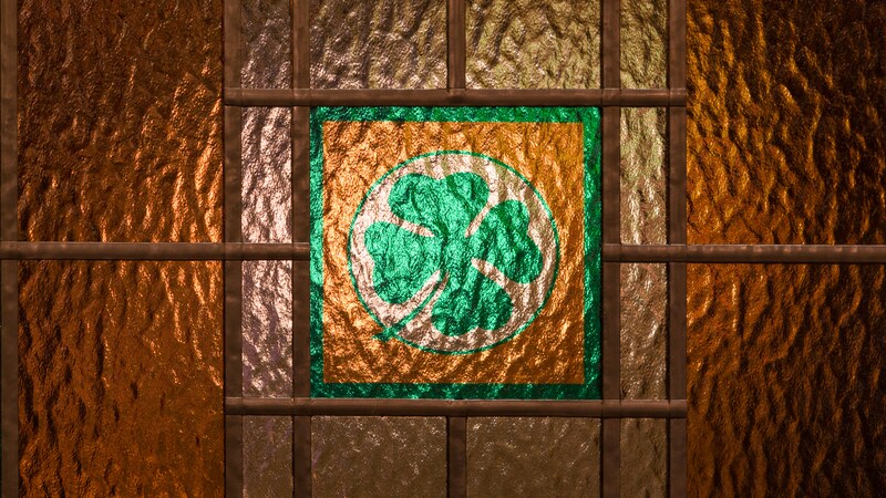 A clover in stained glass makes up part of the window of an Irish pub called O Gills