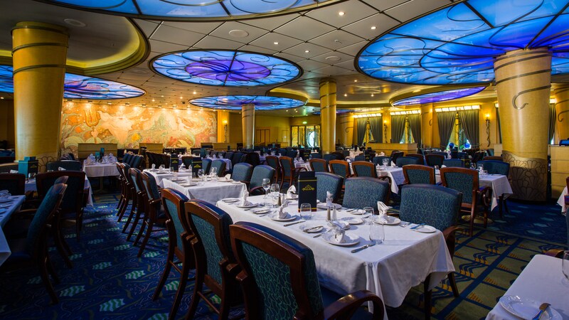 The elegant dining room at Tritons restaurant with a dazzling ocean liner and Art Deco theme