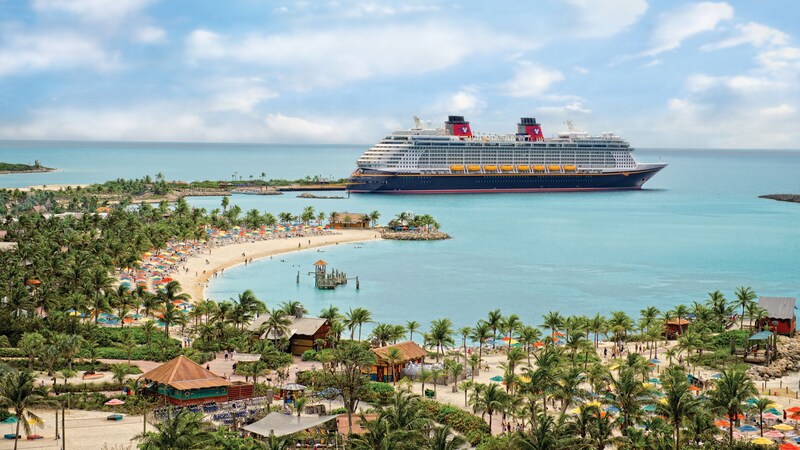 A Disney Cruise Line ship docked in Disney Castaway Cay in The Bahamas