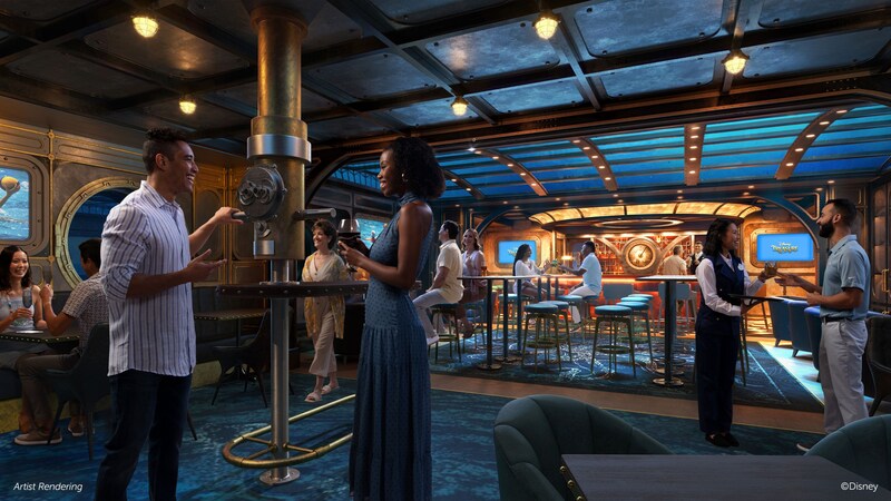 People socializing in a pub designed to look like the interior of a submarine