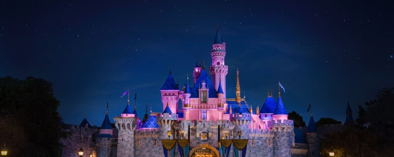 Sleeping Beauty Castle illuminated at night