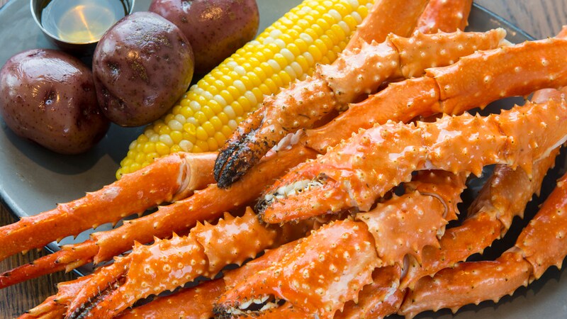 Roast potatoes, corn on the cob, crab legs and an Orlando magazine emblem for the 2018 Dining Awards Readers’ Choice for Best Seafood Restaurant
