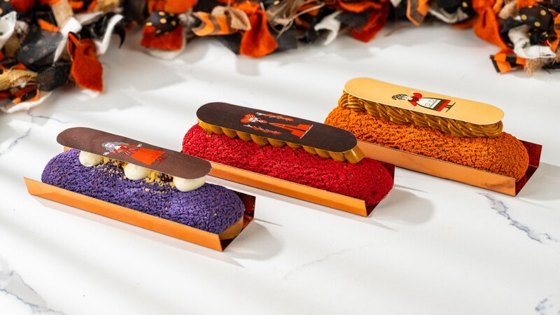 3 Hocus Pocus inspired eclairs including cherry pie, peanut crunch and smores