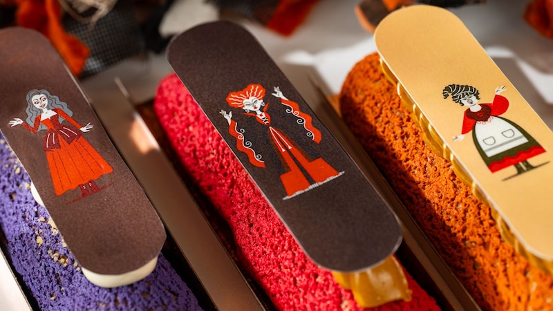 3 Hocus Pocus inspired eclairs including cherry pie, peanut crunch and smores