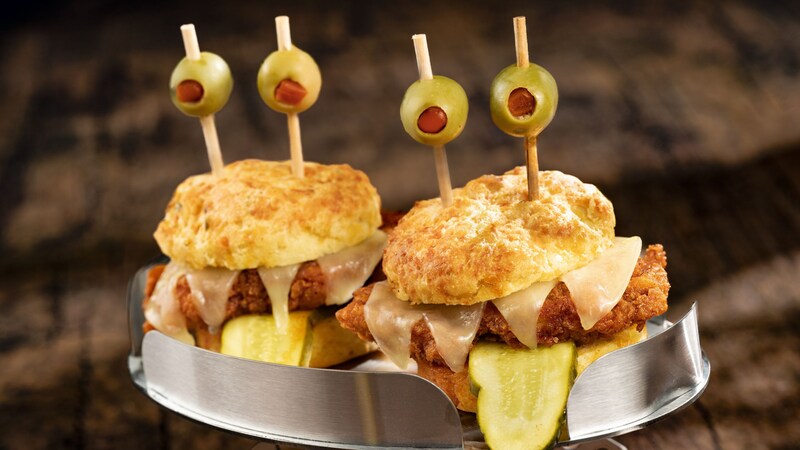 Alien Invader Sliders made with fried chicken and topped with provolone, pickles and olives