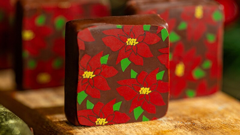 A board with 3 Maple Date Ganache Squares from The Ganachery