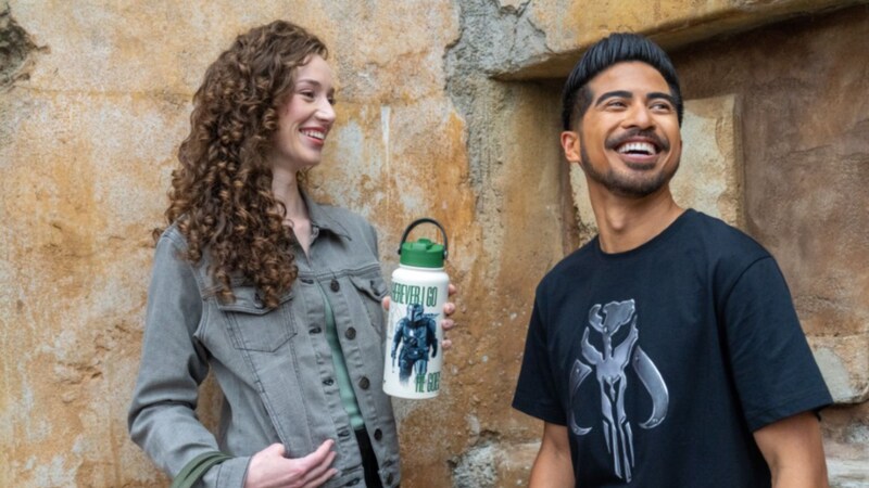 Two Guests smiling together at Disney Springs