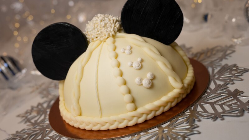 A Mickey Sweater Hat Dome Cake from Amorette’s Patisserie in Disney Springs