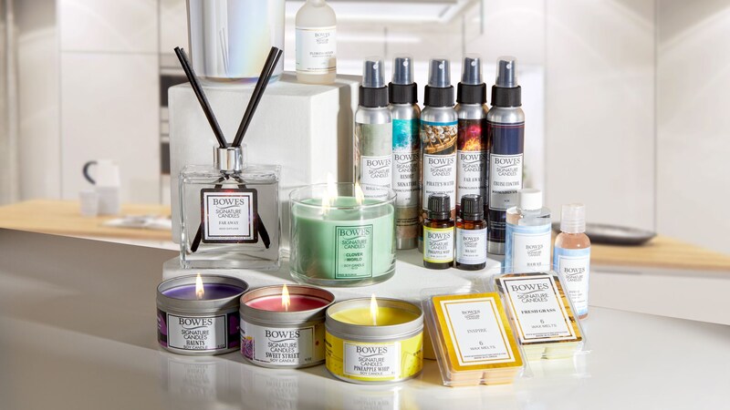 A display of several Bowes Signature Candles, wax melts, sprays and more