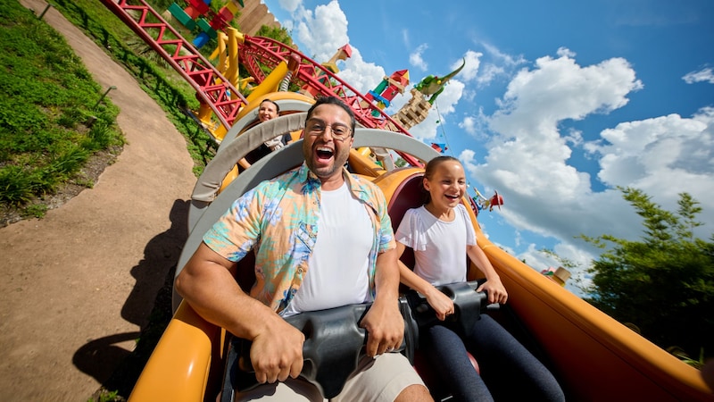 Guests riding Slinky Dog Dash in Toy Story Land at Disney’s Hollywood Studios