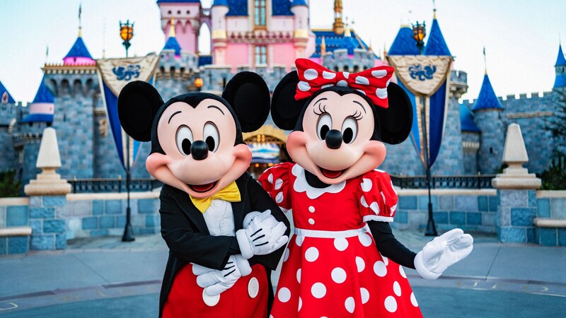 Mickey Mouse and Minnie Mouse in front of Sleeping Beauty Castle at Disneyland Park