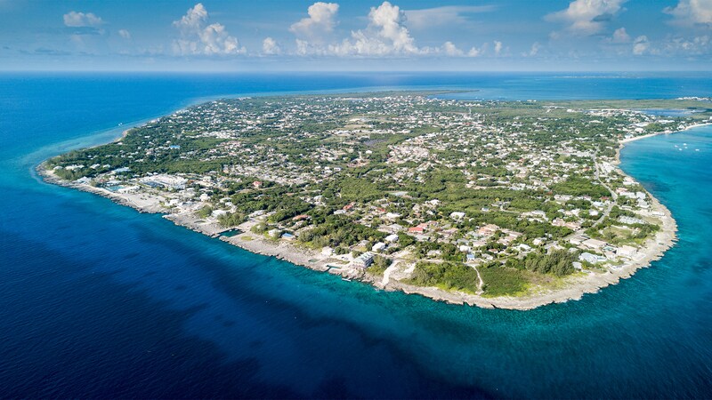 An aerial view of George Town in Grand Cayman surrounded by the Caribbean Sea