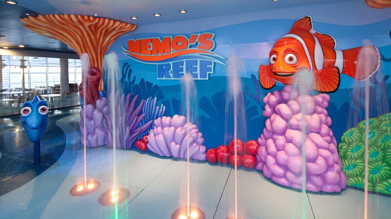 An enclosed water play area featuring water jets and characters from the Disney movie, Finding Nemo