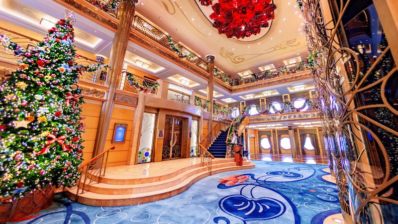 The Disney Wonder atrium decorated for Christmas with garlands, lights and a Christmas tree The Disney Wonder atrium decorated for Christmas with garlands, lights and a Christmas tree