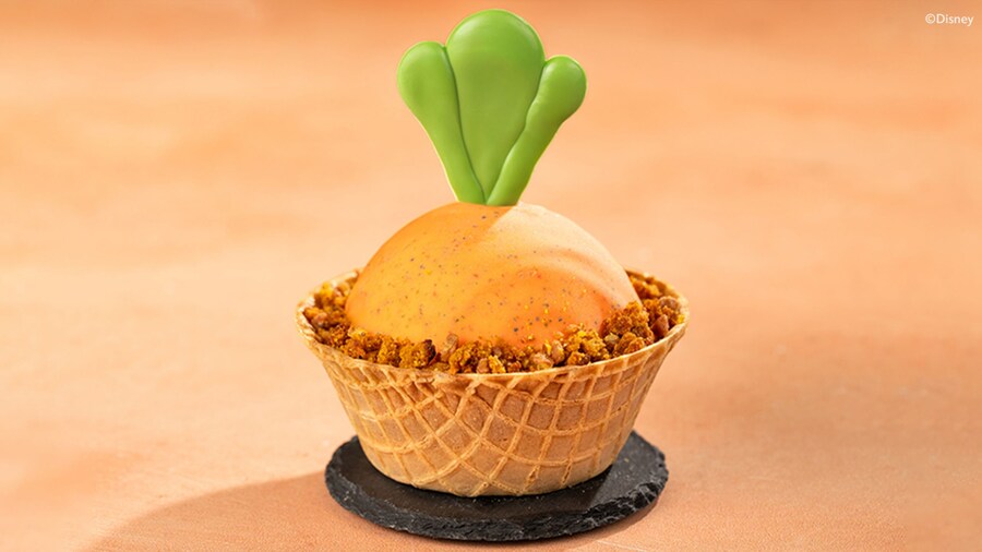 The Carrot Cake Sundae made with vanilla ice cream, caramel sauce, roasted pecan and carrot cake crumbs in a waffle bowl topped with a chocolate carrot top