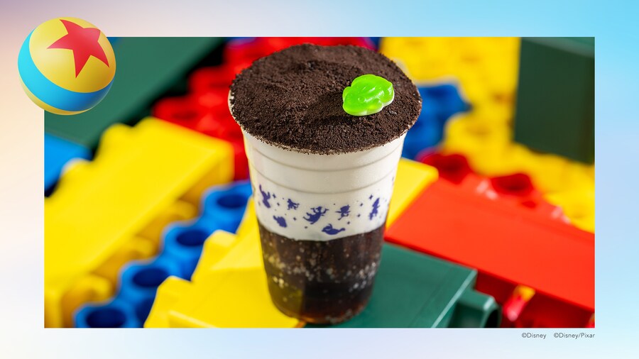 The Screen Time Swirl Float with vanilla soft serve, Coca Cola Zero Sugar topped with chocolate cookie crumbs and a gummy candy frog