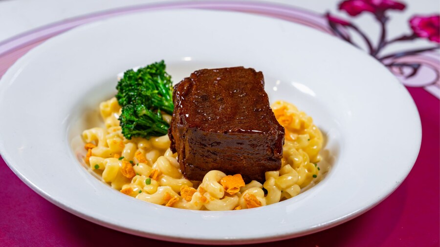 A plate of Braised Short Rib served with macaroni and cheese and broccoli from Carnation Café