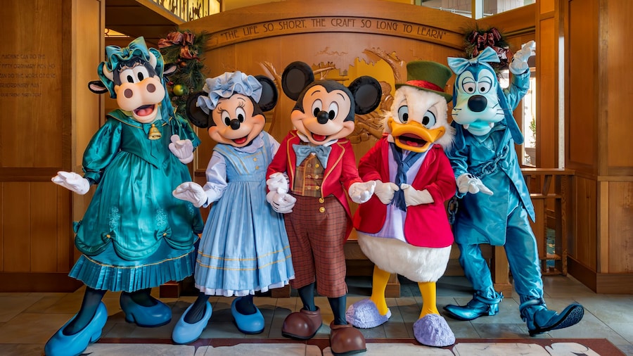 Clarabelle, Mickey Mouse, Minnie Mouse, Goofy and Donald Duck in old time Christmas clothing