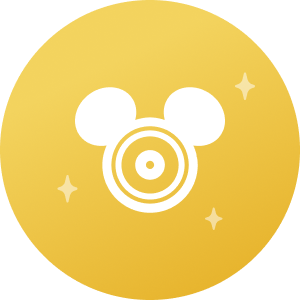An icon featuring a Mickey Mouse head with a camera lens in it representing Disney PhotoPass