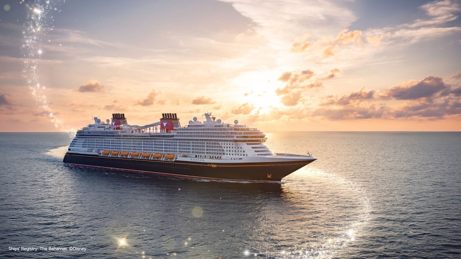 A Disney Cruise ship sails at sunset