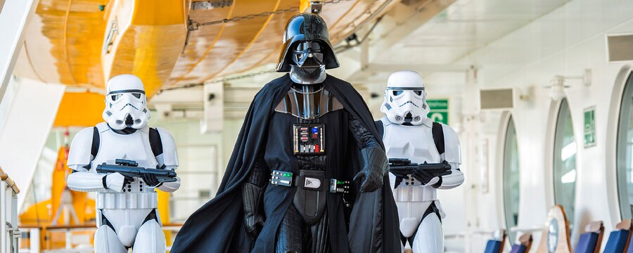 Darth Vader walking with 2 Storm Troopers