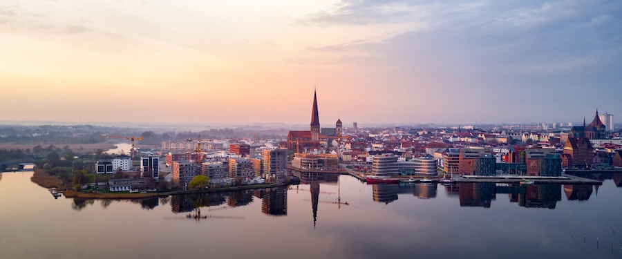 The Rostock shoreline reveals still waters, a large steeple and a mix of old and modern architecture The Rostock shoreline reveals still waters, a large steeple and a mix of old and modern architecture