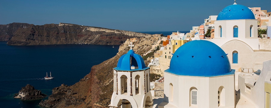 A Greek island with domed minimalist architecture A Greek island with domed minimalist architecture