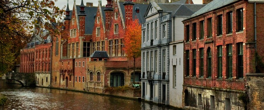 Historic row houses lining the edge of a canal