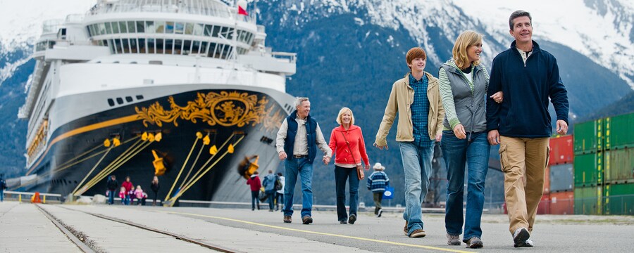 A family has disembarked from a Disney Cruise chip to explore