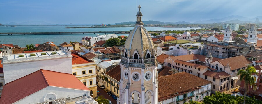 The rooftops of buildings near the coastline of Panama City