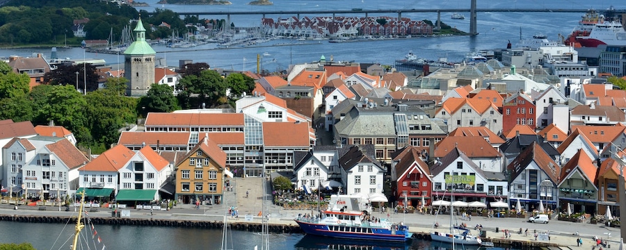 A waterfront promenade with shops and cafes in Stavanger, Norway A waterfront promenade with shops and cafes in Stavanger, Norway