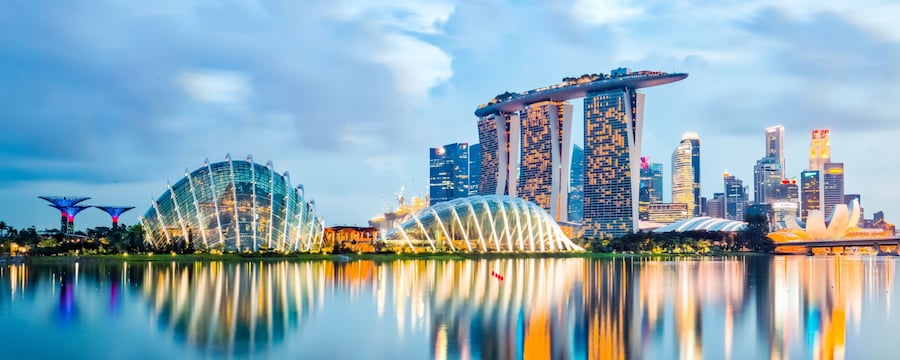 Gardens by the Bay and the Marina Bay Sands Singapore Hotel at night Gardens by the Bay and the Marina Bay Sands Singapore Hotel at night
