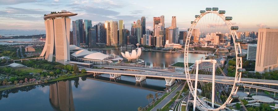 The Marina Bay Sands Singapore Hotel and the Singapore Flyer observation wheel at Marina Bay The Marina Bay Sands Singapore Hotel and the Singapore Flyer observation wheel at Marina Bay