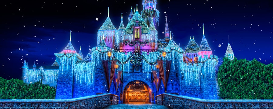 Sleeping Beauty Castle decorated with Christmas lights and ornamentation