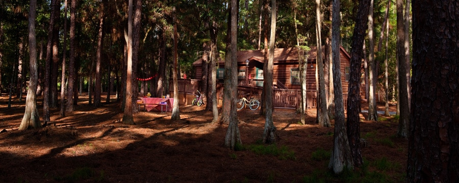Chalet au milieu des arbres au Disney’s Fort Wilderness Resort