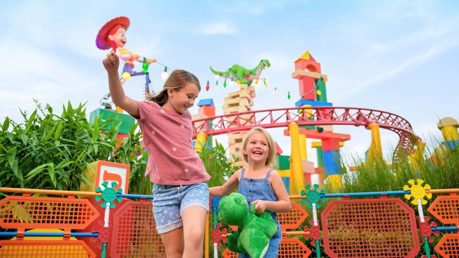 Little sisters play big at Toy Story Land