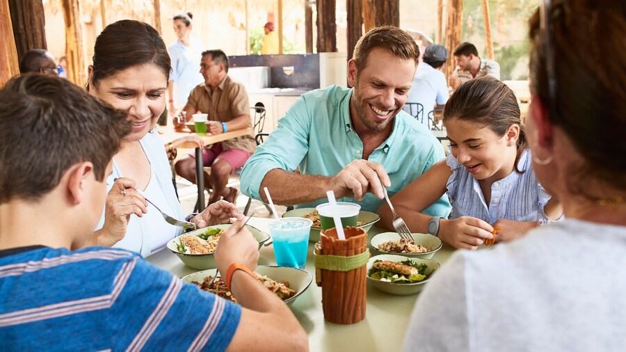 Family eating at Satu'li Canteen