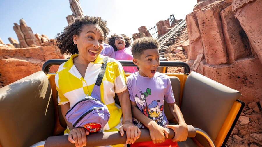 Family Enjoy Big Thunder Mountain Railroad