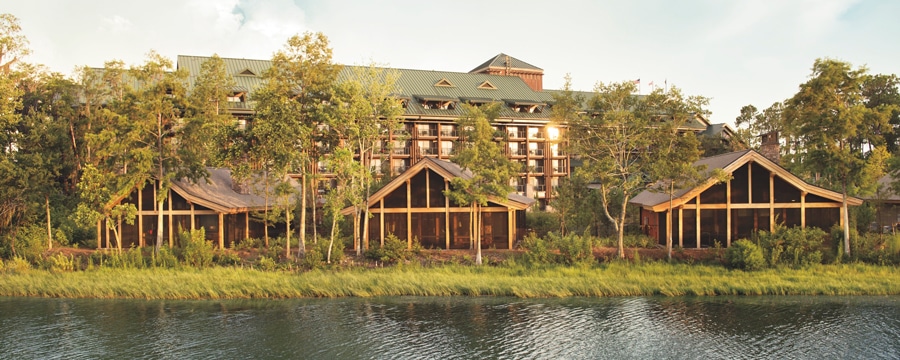Pine trees surrounding 3 waterfront cabins at Cooper Creek Villas & Cabins at Disney's Wilderness Lodge