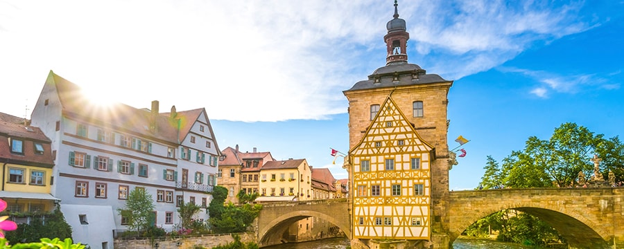 The Old Town Hall in Bamberg with the Regnitz River flowing under its bridge