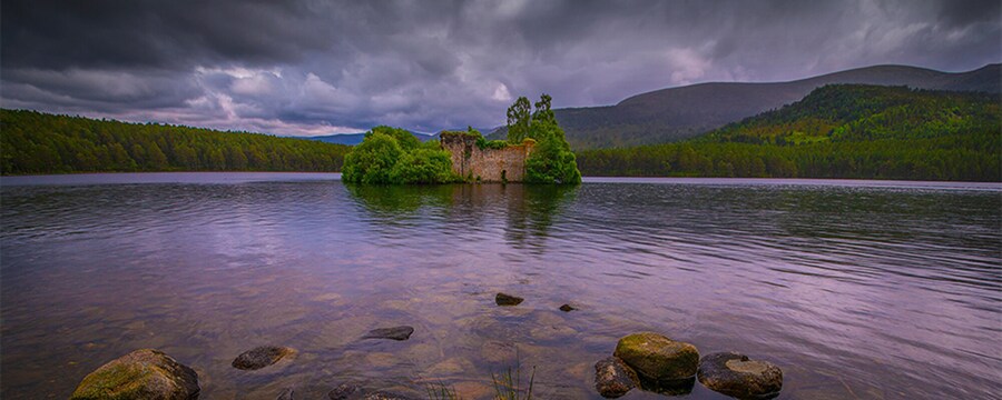 Loch an Eilein Castle sits on an island in Loch an Eilein