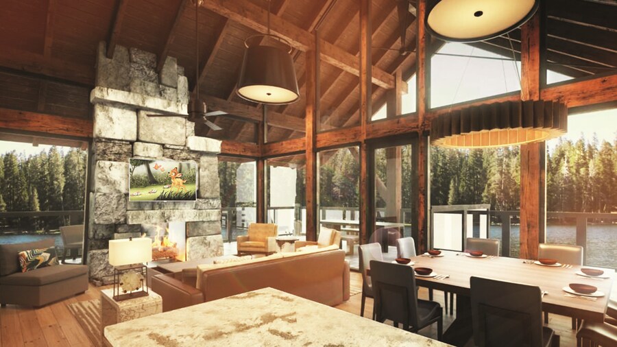 Sofa and pillows, coffee table, wall art, flat-screen TV, curtained balcony with view of pine trees, armchair